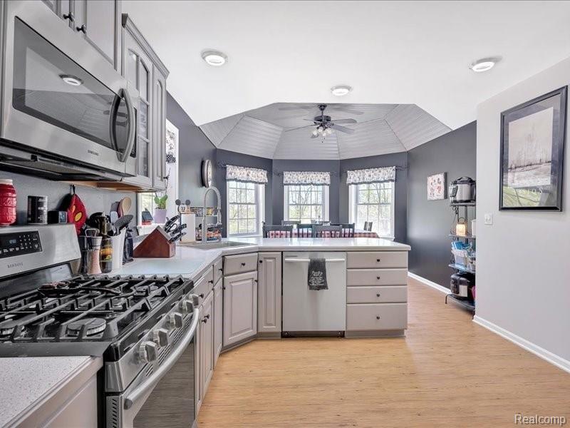 1853 Mitchell Lake Road Attica, MI 48412 - Photo 15 of 40 Kitchen Opens to Dining Room with Bay Window