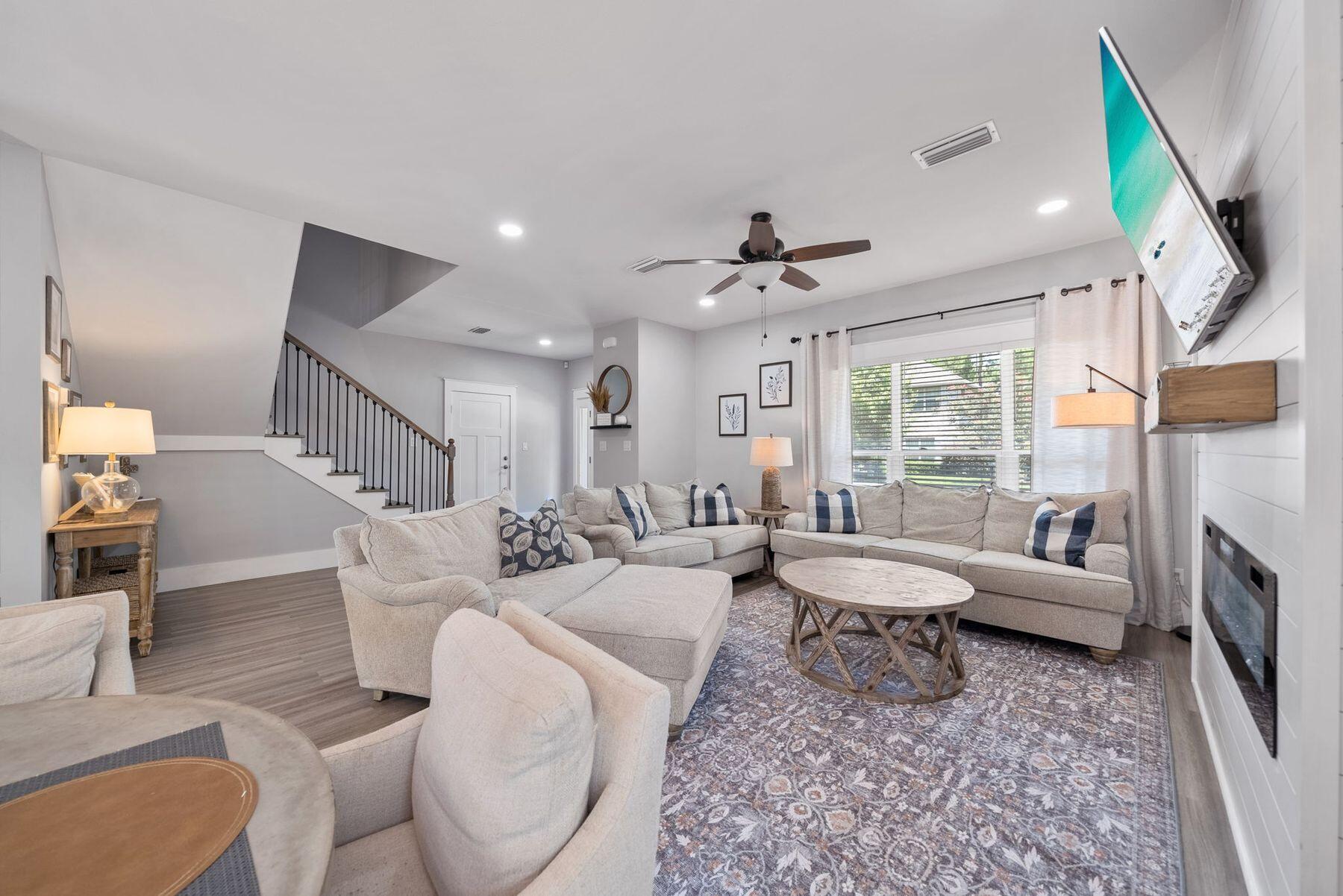 297 Cox Road Santa Rosa Beach, FL 32459 - Photo 13 of 41 a living room with furniture and a large window