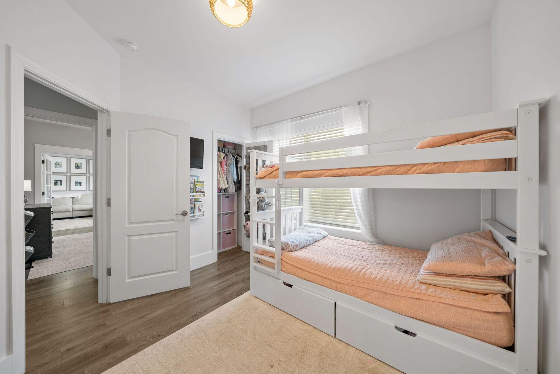 297 Cox Road Santa Rosa Beach, FL 32459 - Photo 29 of 41 a en suite bathroom with a double vanity sink and a large mirror