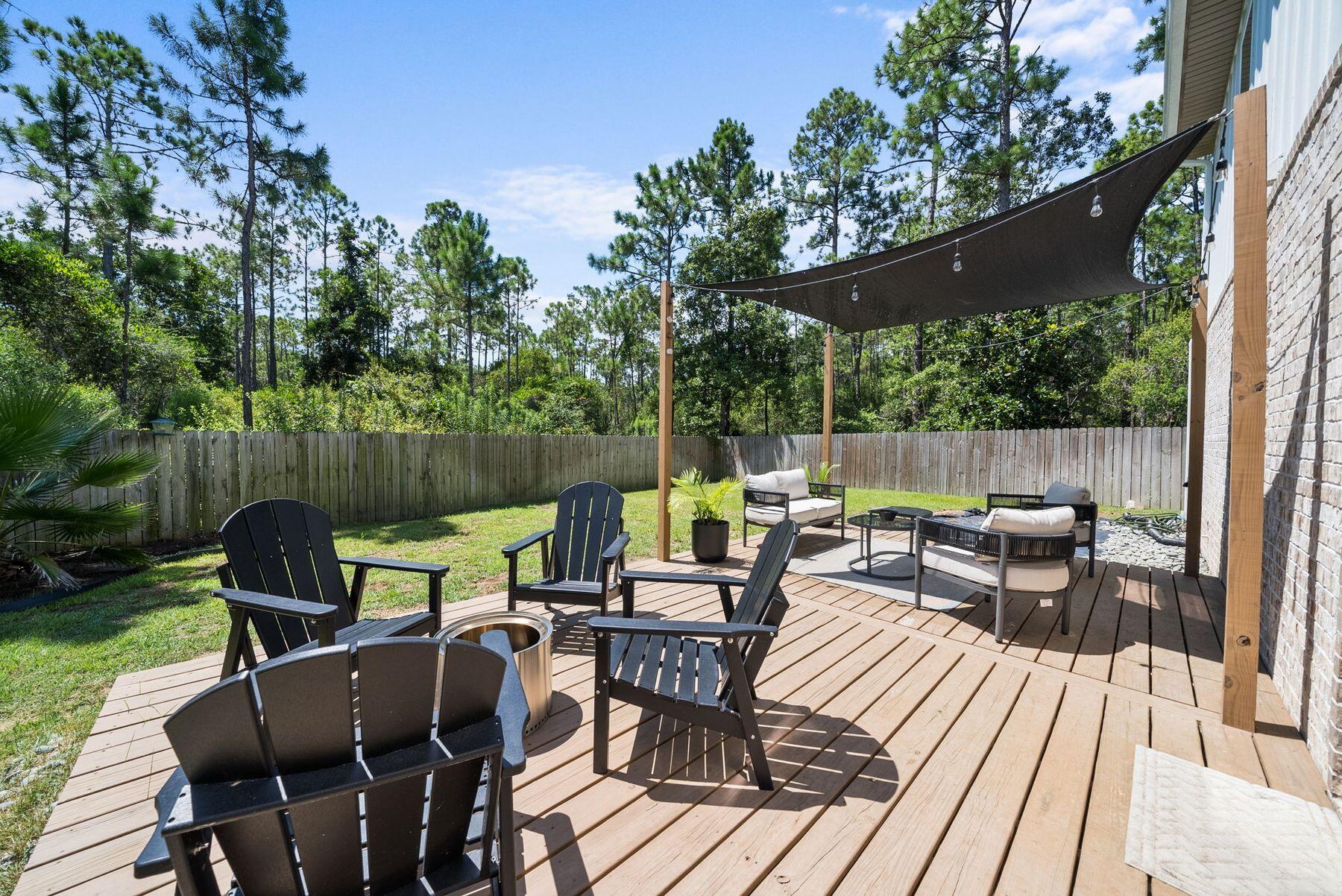 297 Cox Road Santa Rosa Beach, FL 32459 - Photo 35 of 41 a view of a patio on the deck