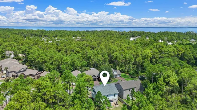 a view of a back yard from a garden