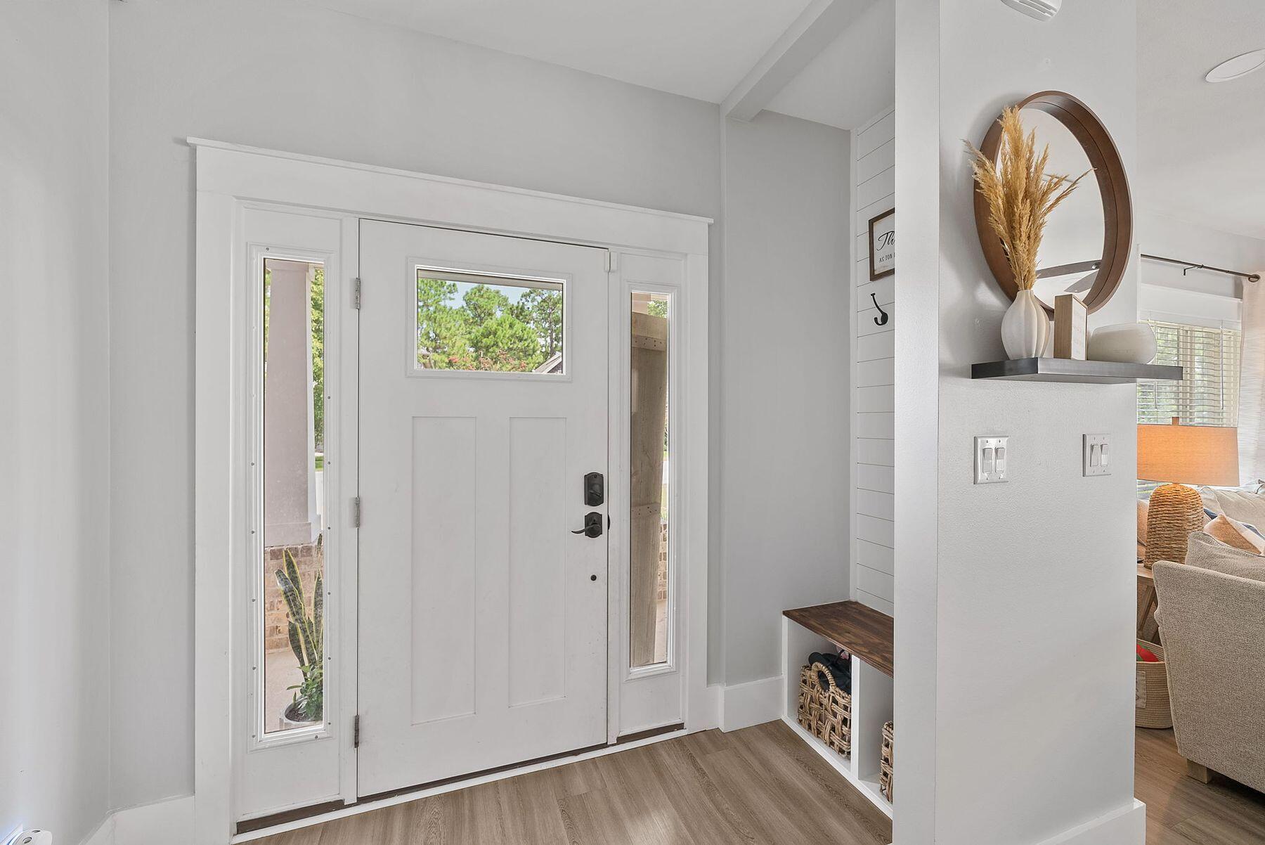297 Cox Road Santa Rosa Beach, FL 32459 - Photo 5 of 41 a view of room with washer and dryer