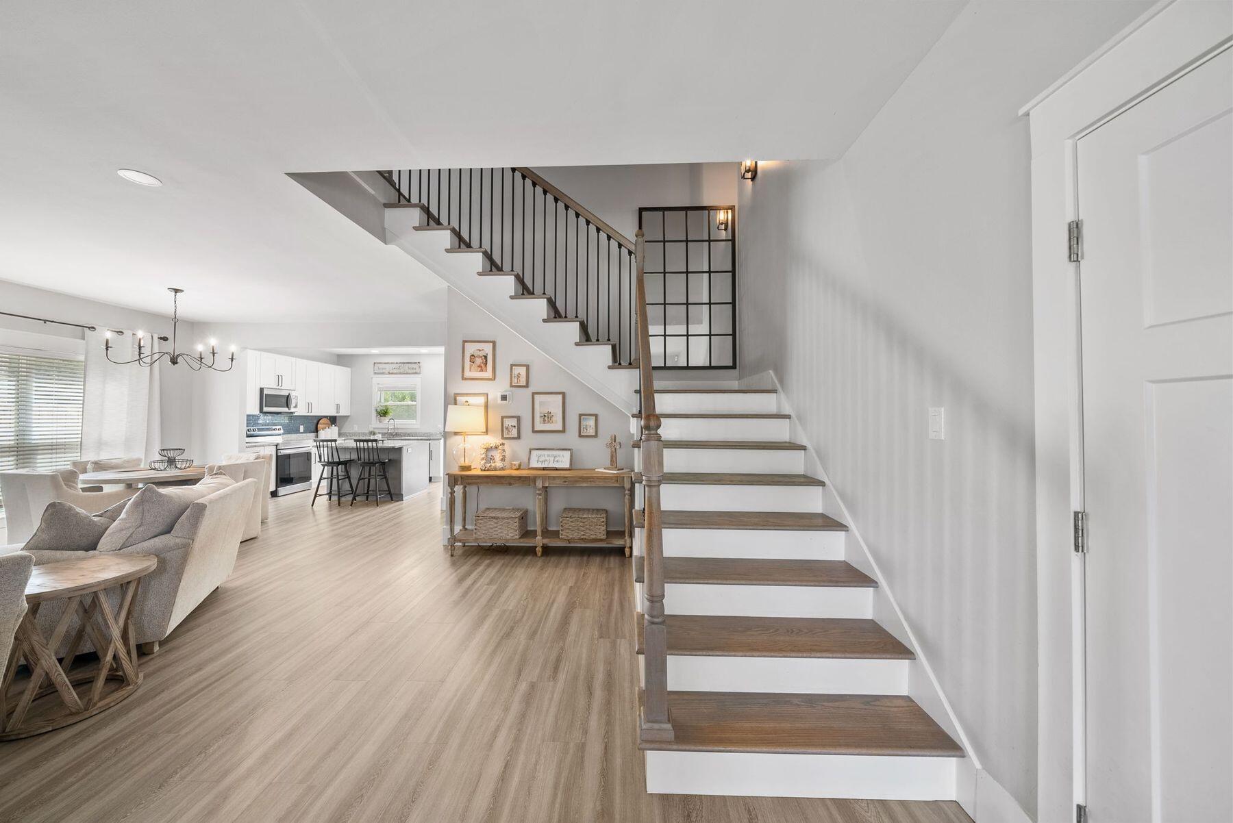 297 Cox Road Santa Rosa Beach, FL 32459 - Photo 6 of 41 a view of entryway and hall with wooden floor