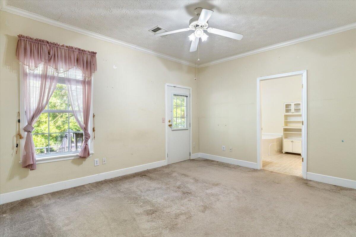 2941 Ferris Drive Navarre, FL 32566 - Photo 11 of 32 a view of an empty room with a window