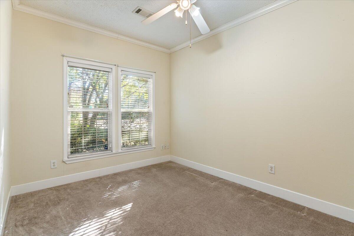 2941 Ferris Drive Navarre, FL 32566 - Photo 16 of 32 an empty room with a window