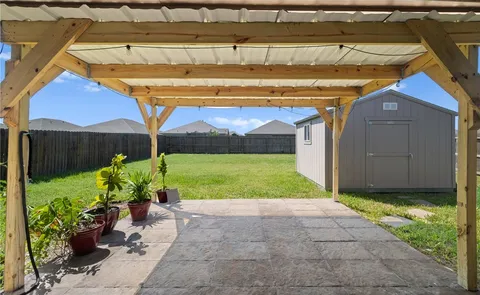 a view of backyard with garden and plants