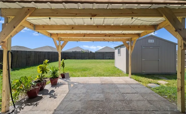a view of backyard with garden and plants