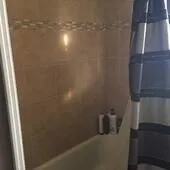 a close up of a sink and a window