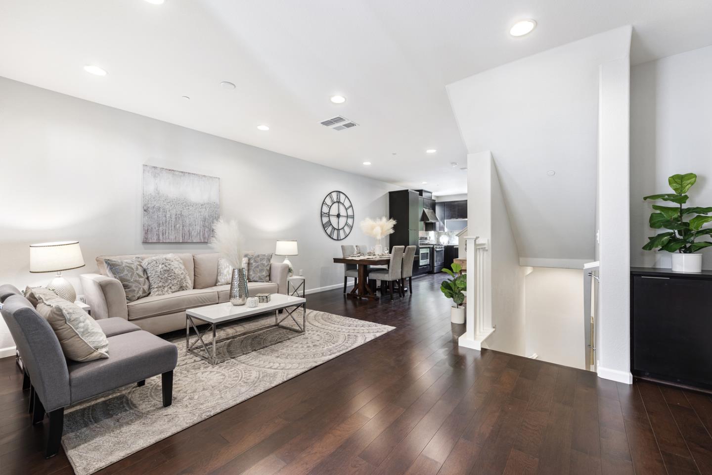 6063 Raleigh Road San Jose, CA 95123 - Photo 11 of 44 a living room with furniture and a wooden floor