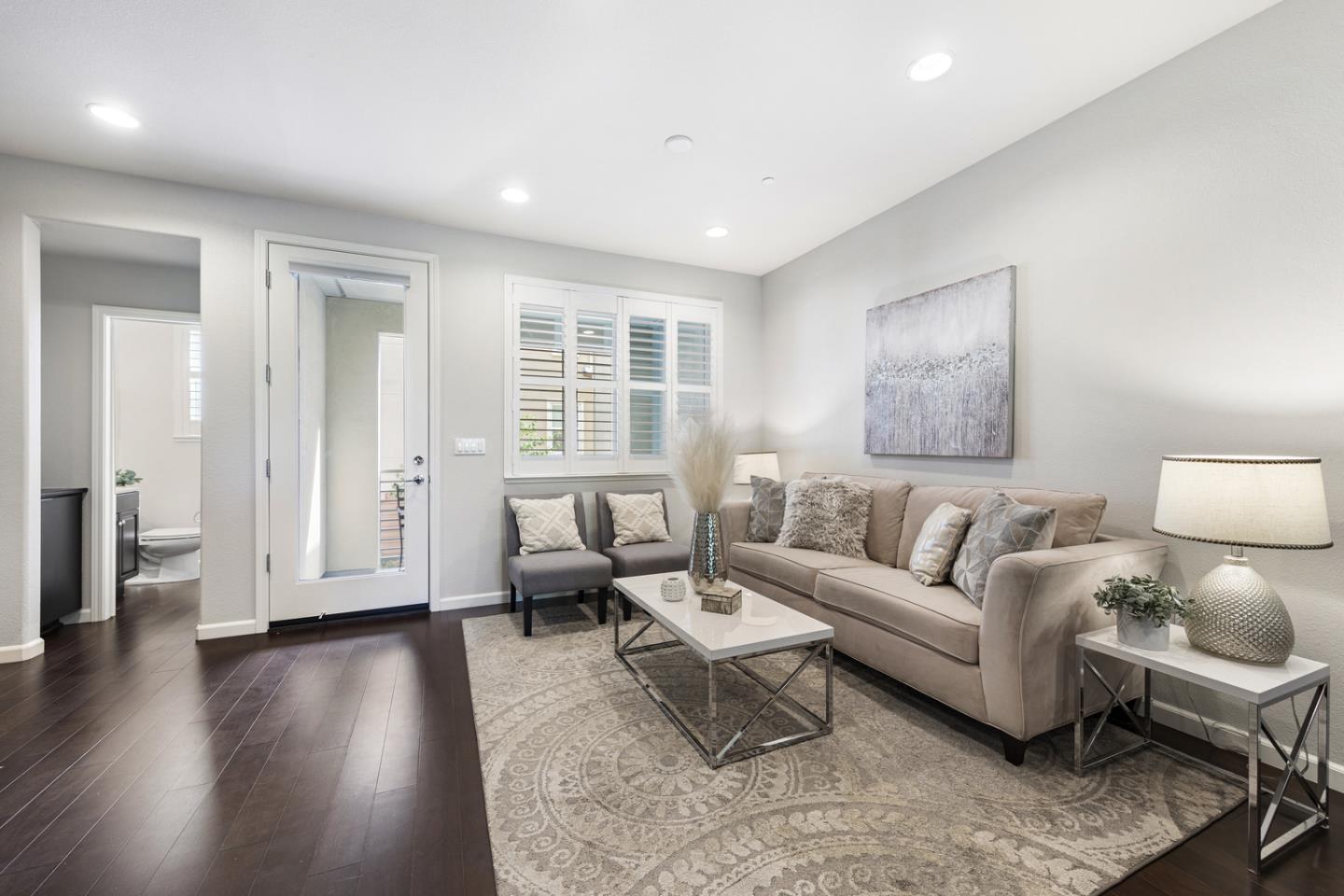 6063 Raleigh Road San Jose, CA 95123 - Photo 13 of 44 a living room with furniture and a wooden floor