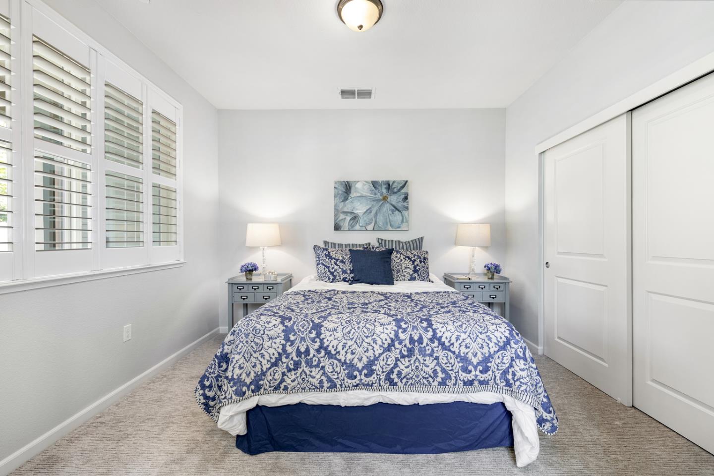 6063 Raleigh Road San Jose, CA 95123 - Photo 16 of 44 a bedroom with a bed and a window