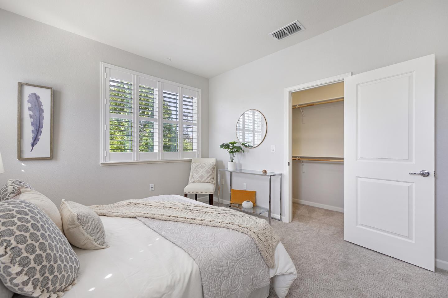 6063 Raleigh Road San Jose, CA 95123 - Photo 21 of 44 a bedroom with a bed and a chandelier