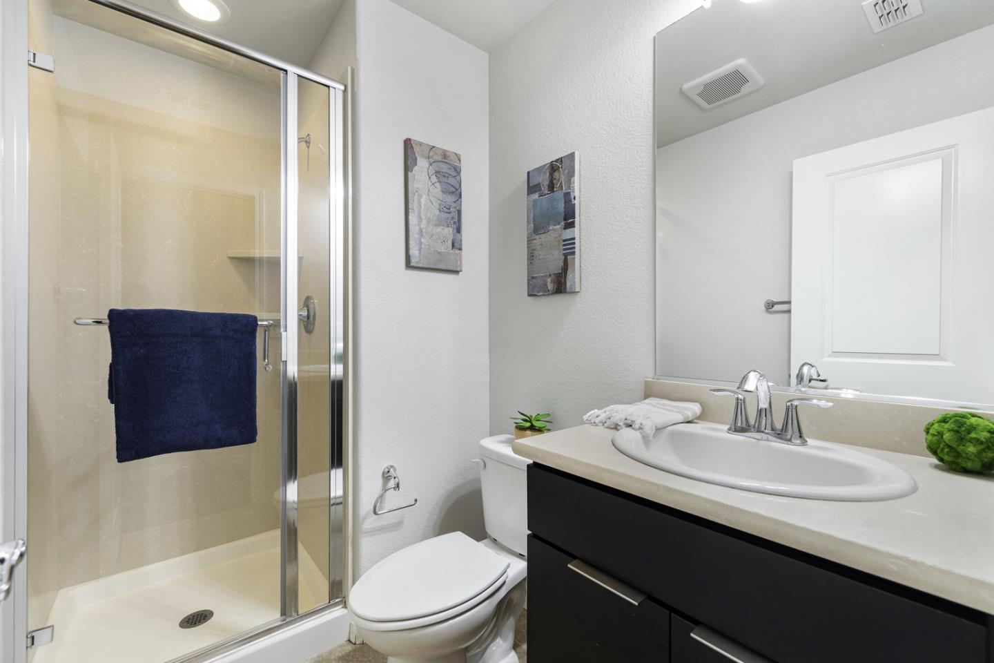 6063 Raleigh Road San Jose, CA 95123 - Photo 23 of 44 a bathroom with a sink a toilet and shower