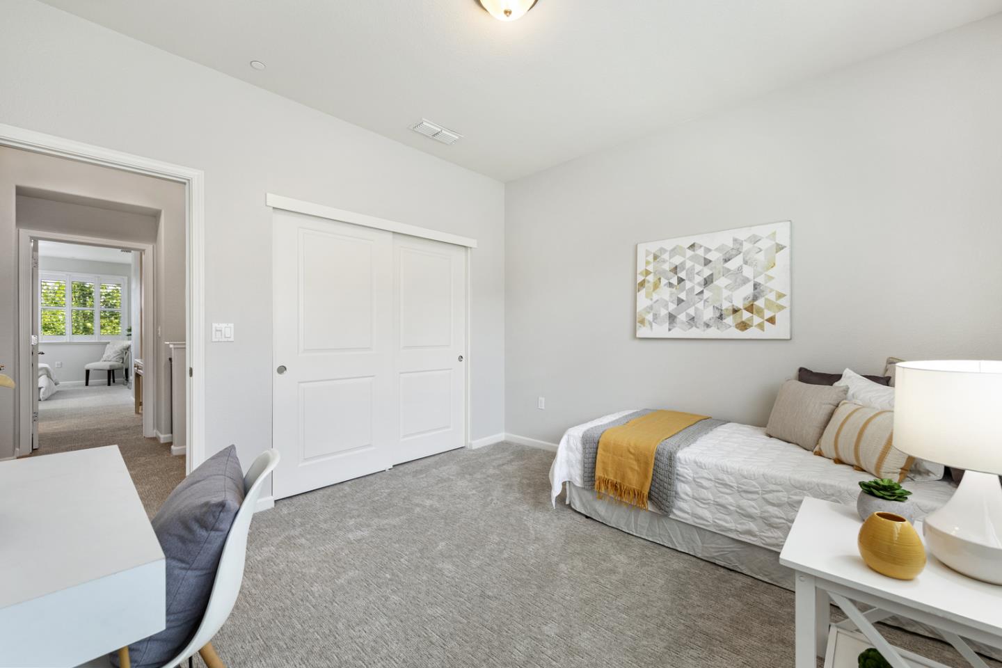 6063 Raleigh Road San Jose, CA 95123 - Photo 26 of 44 a bedroom with bed and a couch