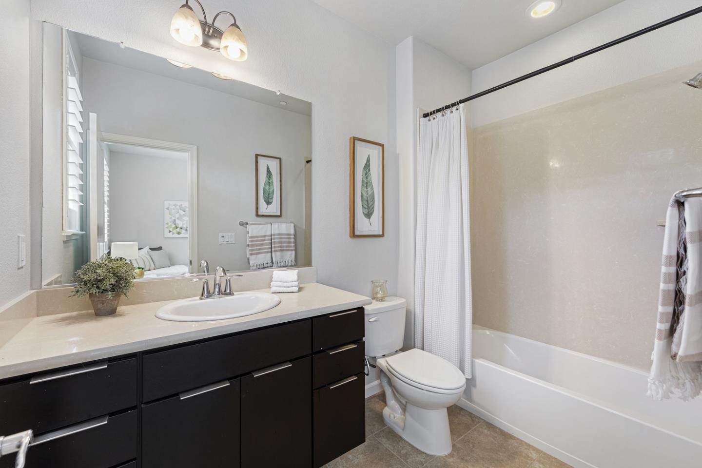 6063 Raleigh Road San Jose, CA 95123 - Photo 27 of 44 a bathroom with a sink a toilet and shower