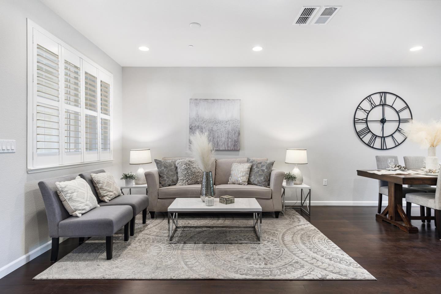 6063 Raleigh Road San Jose, CA 95123 - Photo 10 of 44 a living room with furniture a rug and a window