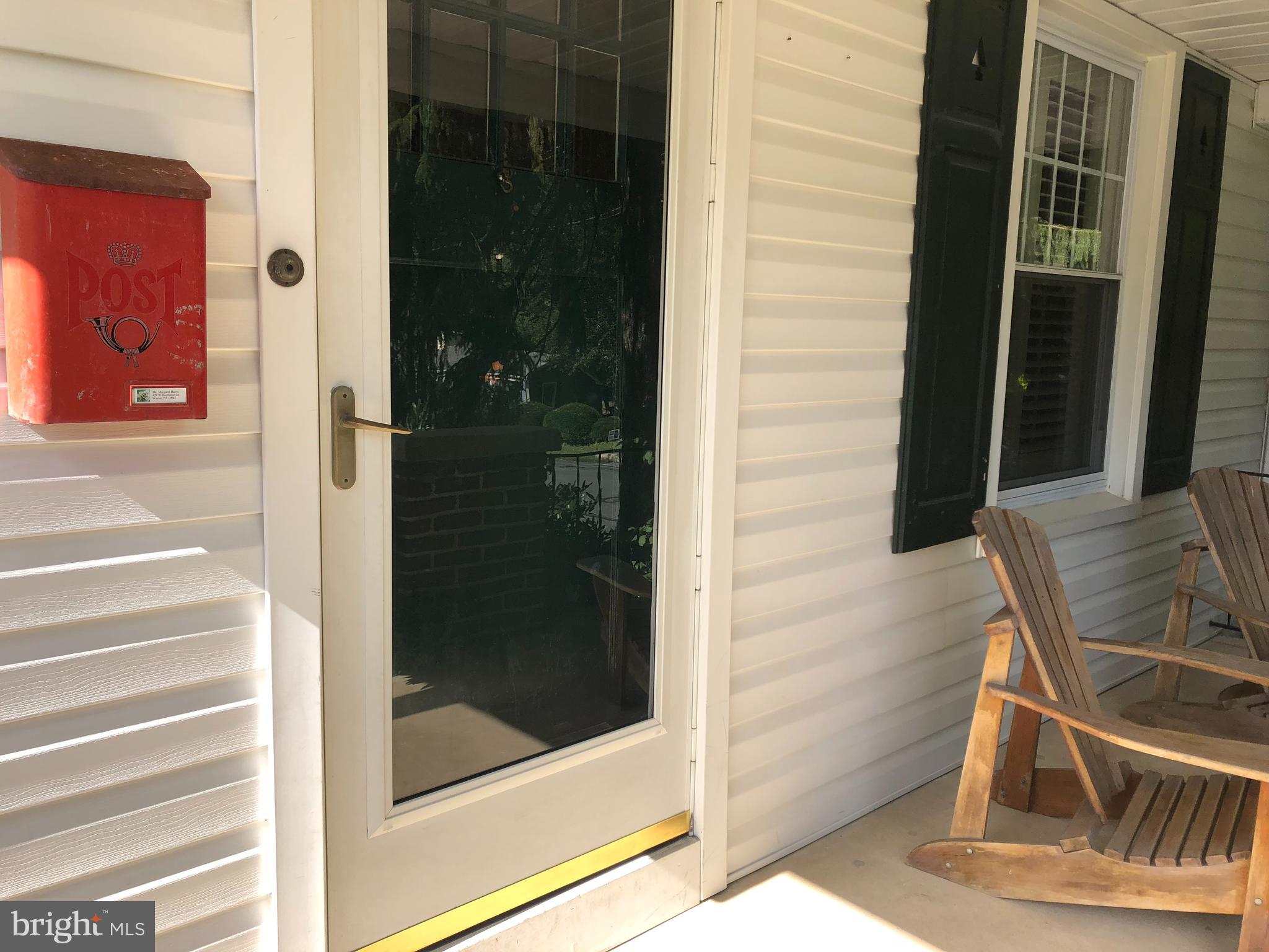 428 West Beechtree Lane Wayne, PA 19087 - Photo 2 of 2 a bathroom with a glass shower door