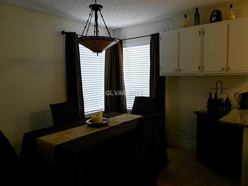 2200 South Fort Apache Road, Unit 1198 Las Vegas, NV 89117 - Photo 11 of 27 Dining Room. extra cabinetry added to dining room