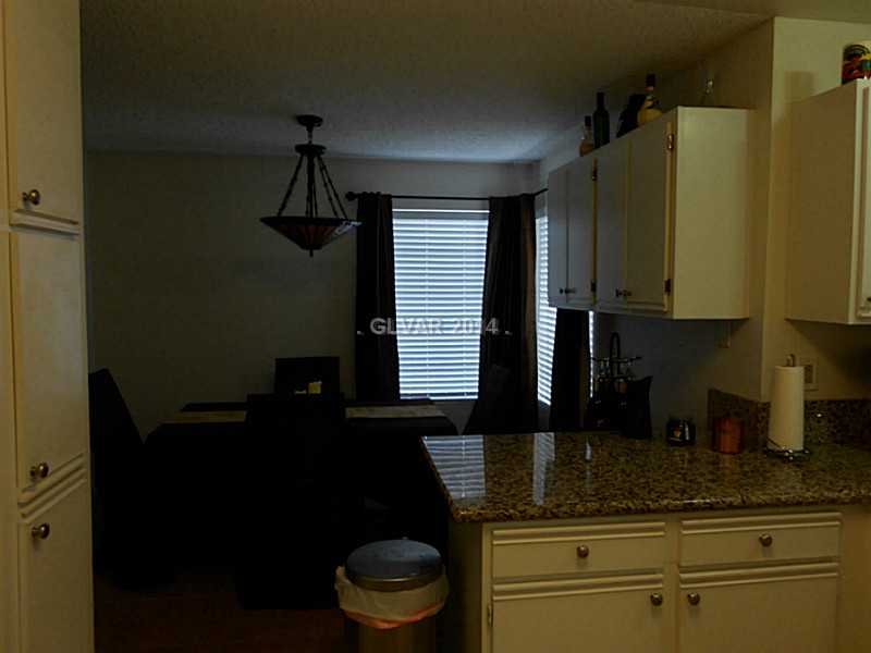 2200 South Fort Apache Road, Unit 1198 Las Vegas, NV 89117 - Photo 12 of 27 Dining Room. Dining room adjacent to kitchen