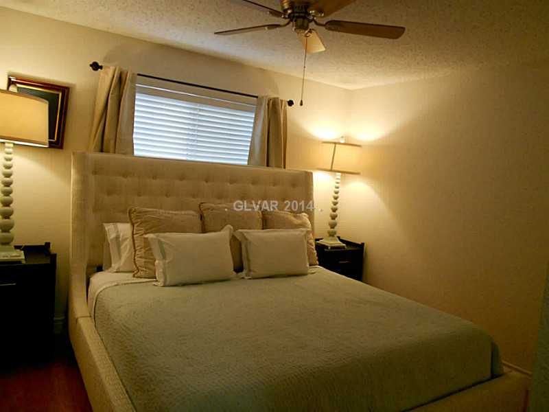 2200 South Fort Apache Road, Unit 1198 Las Vegas, NV 89117 - Photo 13 of 27 Guest Bedroom. Front bedroom