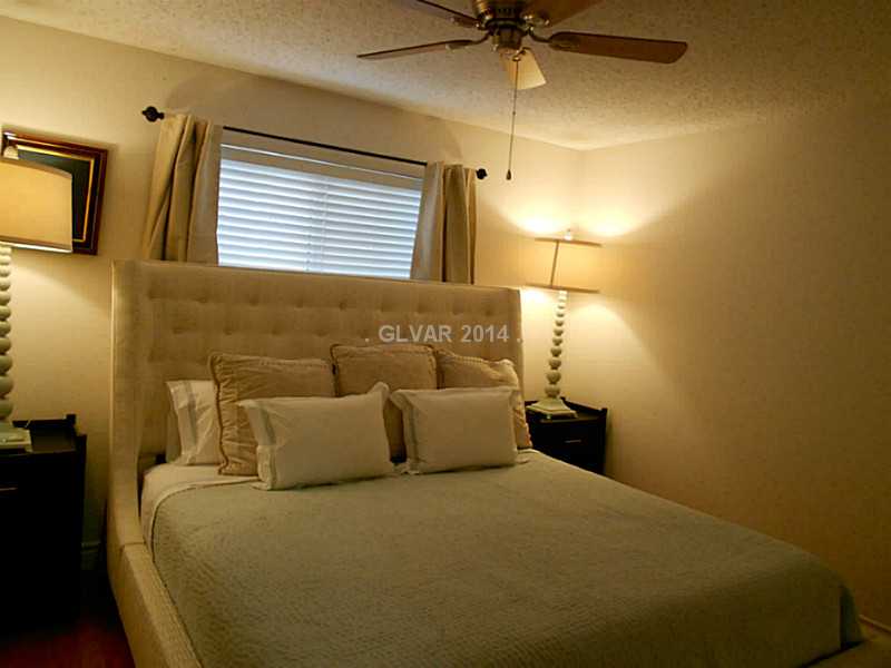 2200 South Fort Apache Road, Unit 1198 Las Vegas, NV 89117 - Photo 14 of 27 Guest Bedroom. Bedroom with ceiling fan