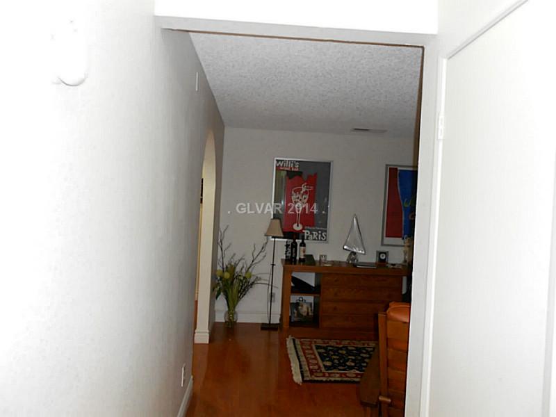 2200 South Fort Apache Road, Unit 1198 Las Vegas, NV 89117 - Photo 2 of 27 Entry Hall. Hallway into the condo