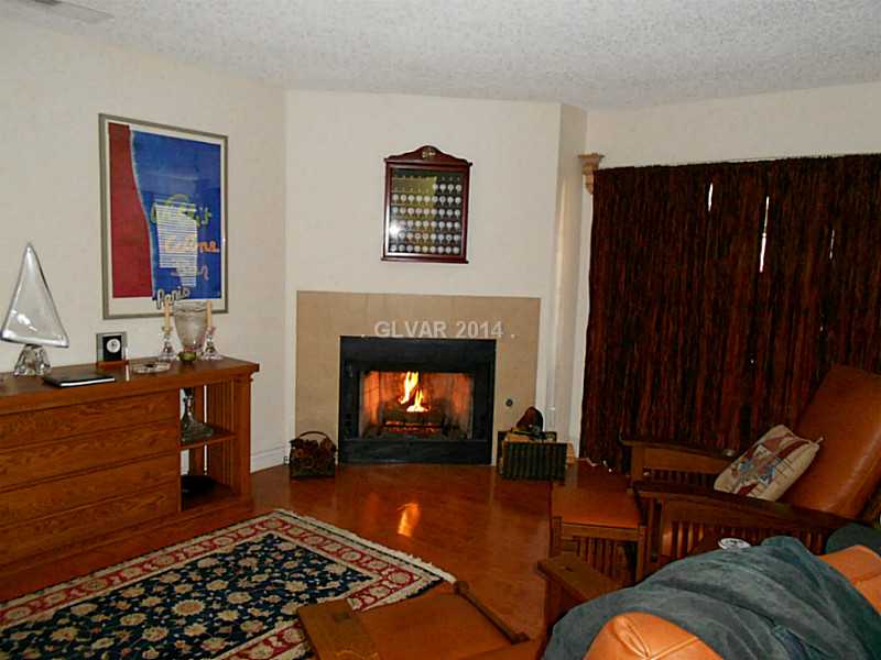 2200 South Fort Apache Road, Unit 1198 Las Vegas, NV 89117 - Photo 4 of 27 Living Room. Living Room with fireplace