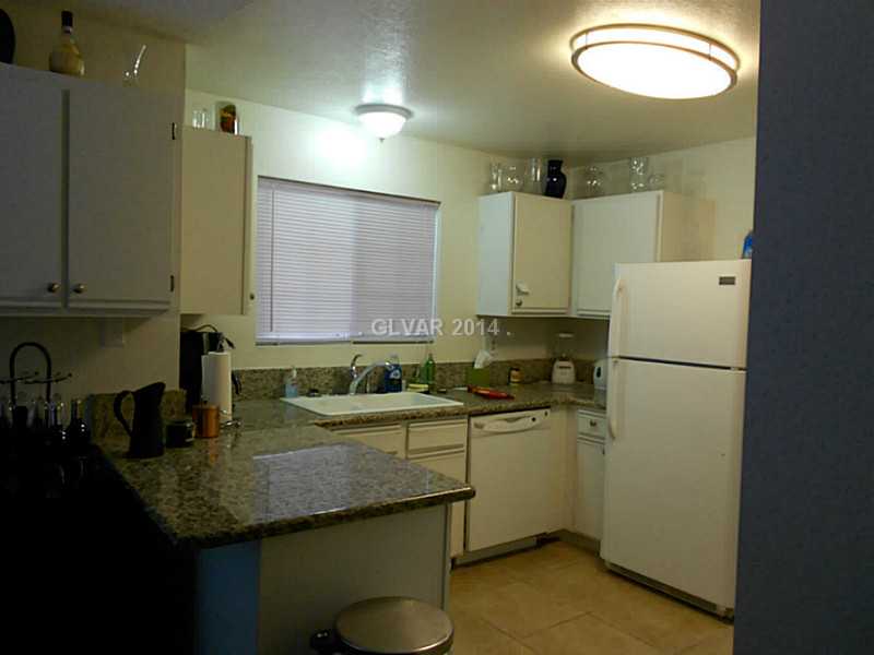 2200 South Fort Apache Road, Unit 1198 Las Vegas, NV 89117 - Photo 8 of 27 Kitchen. nice kitchen with white cabinetry and appliances