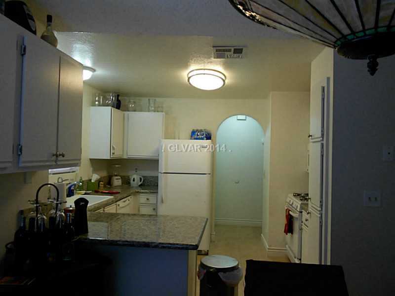 2200 South Fort Apache Road, Unit 1198 Las Vegas, NV 89117 - Photo 10 of 27 Kitchen. small breakfast counter - granite counters