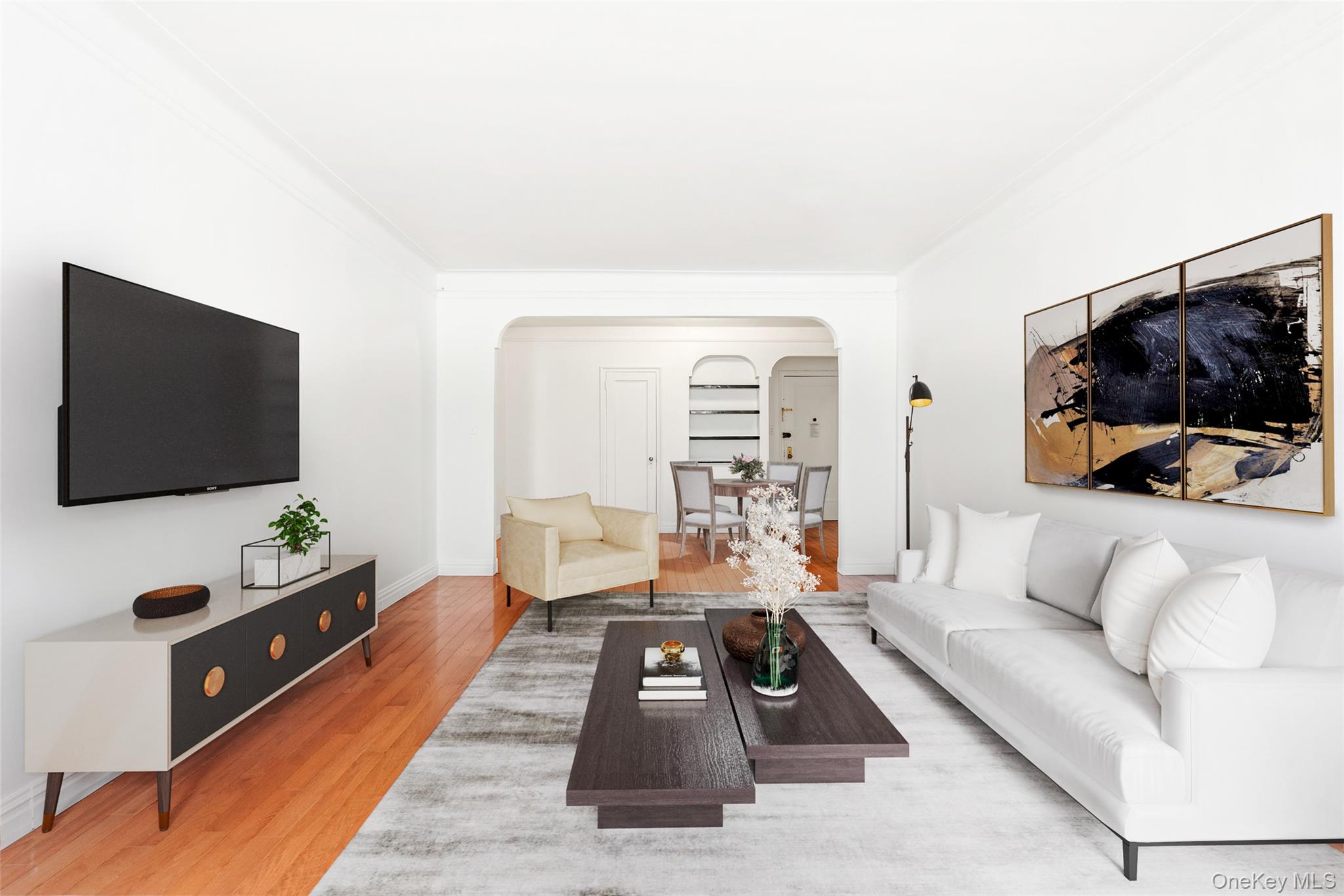 111-39 76th Road, Unit E7 Queens, NY 11375 - Photo 7 of 23 a living room with furniture and a flat screen tv