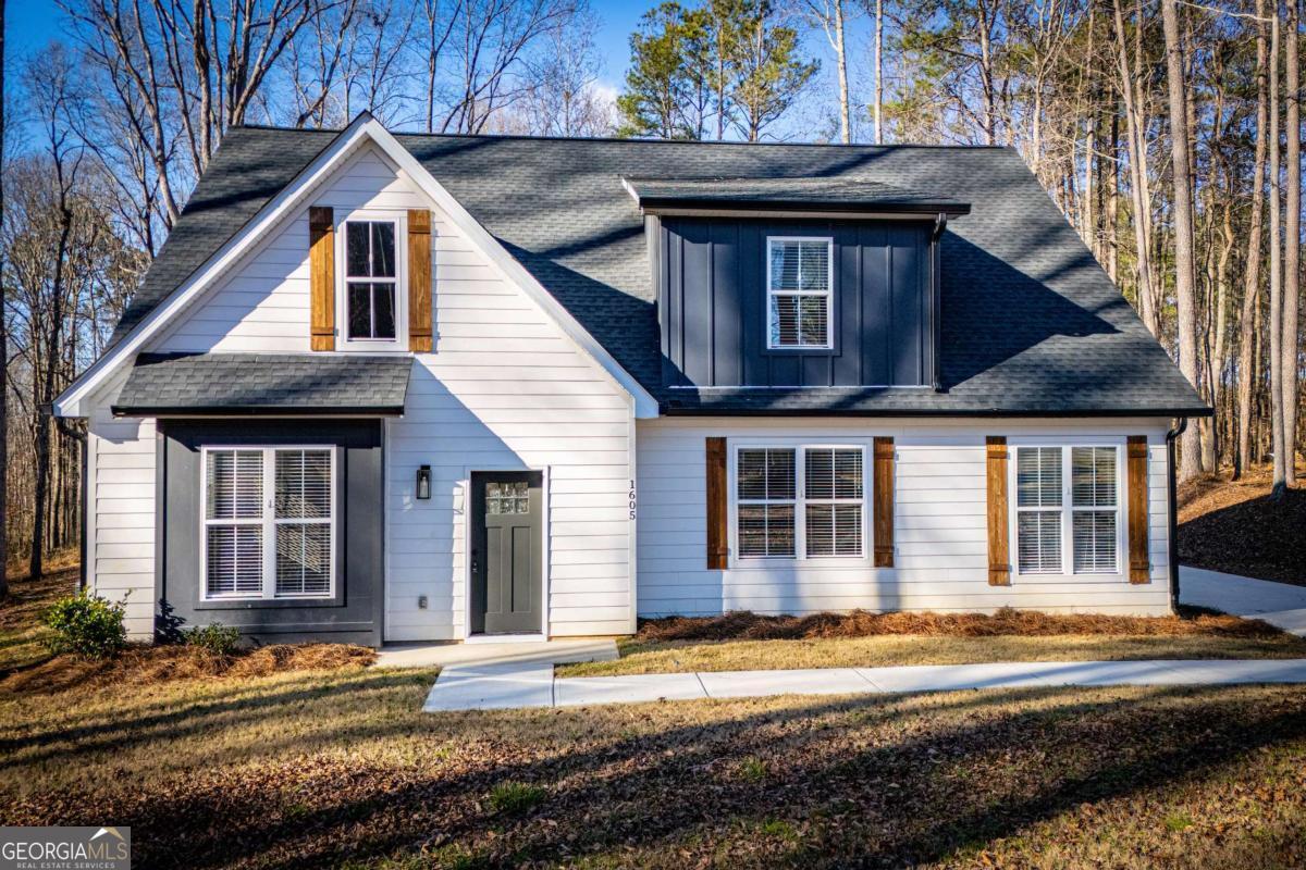 1605 5 Points Road Waco, GA 30182 - Photo 1 of 61 a front view of a house with a yard