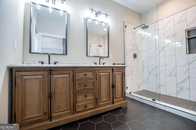 a view of an empty room with a ceiling fan