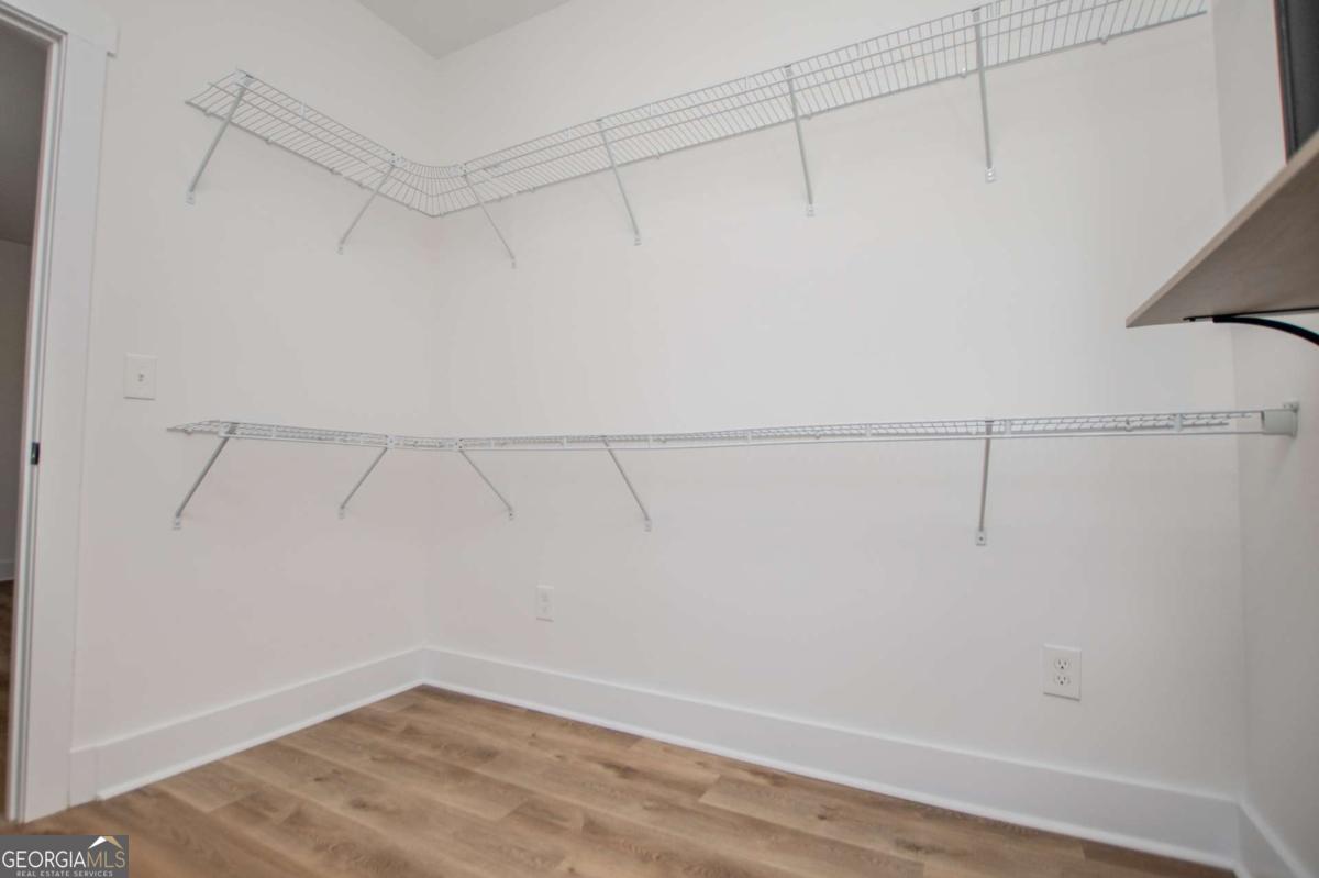 1605 5 Points Road Waco, GA 30182 - Photo 29 of 61 a view of a room with racks on the wall