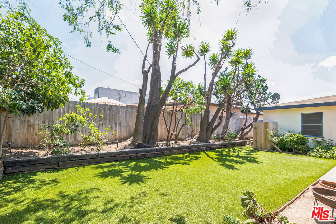 12753 Appleton Way Los Angeles, CA 90066 - Photo 12 of 31 a front view of a house with a yard
