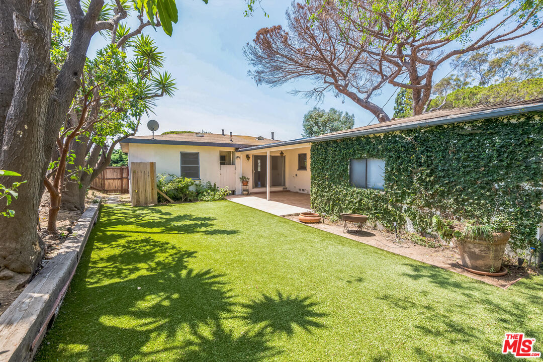 12753 Appleton Way Los Angeles, CA 90066 - Photo 14 of 31 a view of a house with a yard