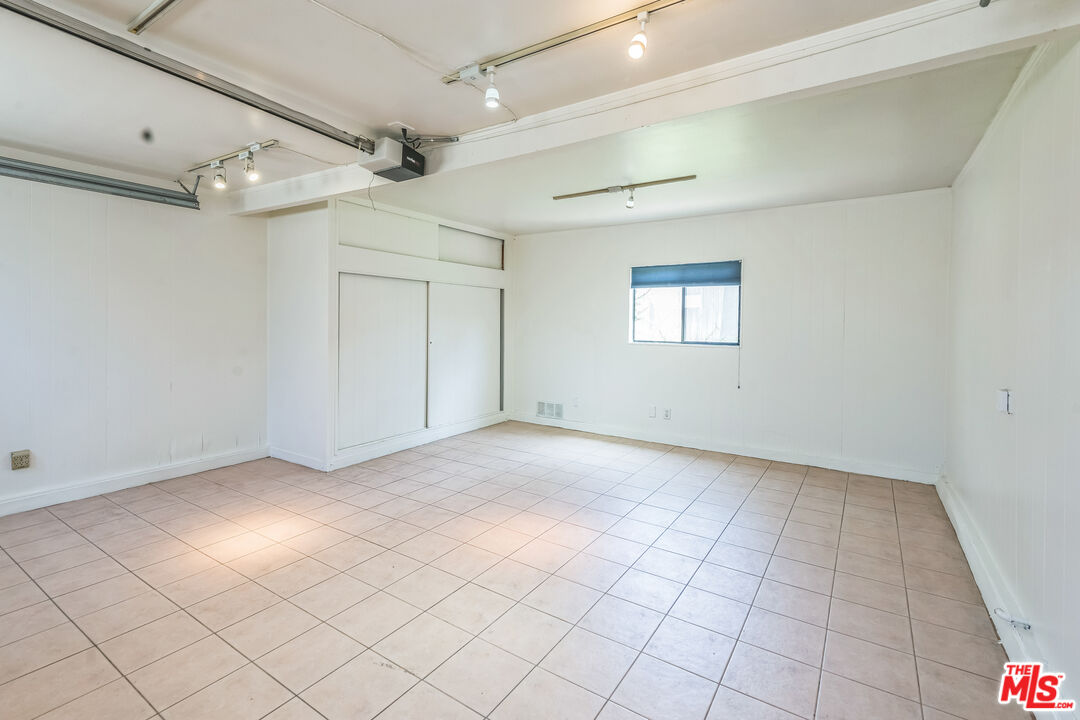 12753 Appleton Way Los Angeles, CA 90066 - Photo 19 of 31 en empty room with windows