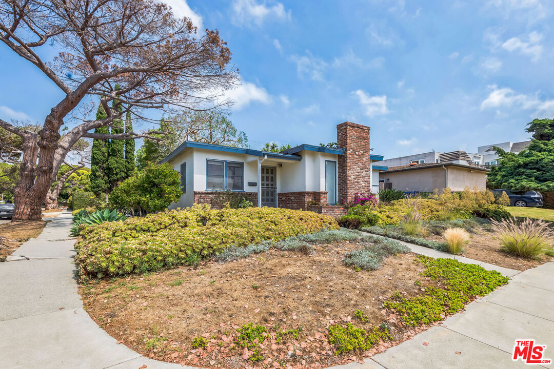 12753 Appleton Way Los Angeles, CA 90066 - Photo 28 of 31 a front view of a house with garden
