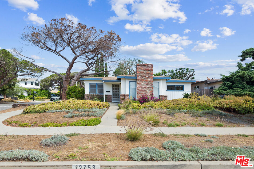 12753 Appleton Way Los Angeles, CA 90066 - Photo 30 of 31 front view of a house with a pathway