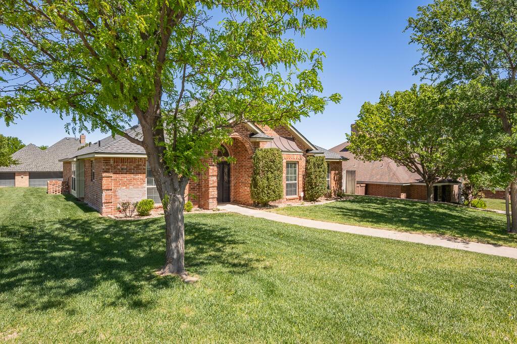 6604 Pepper Tree Place Amarillo, TX 79124 - Photo 3 of 28 a front view of house with yard and green space