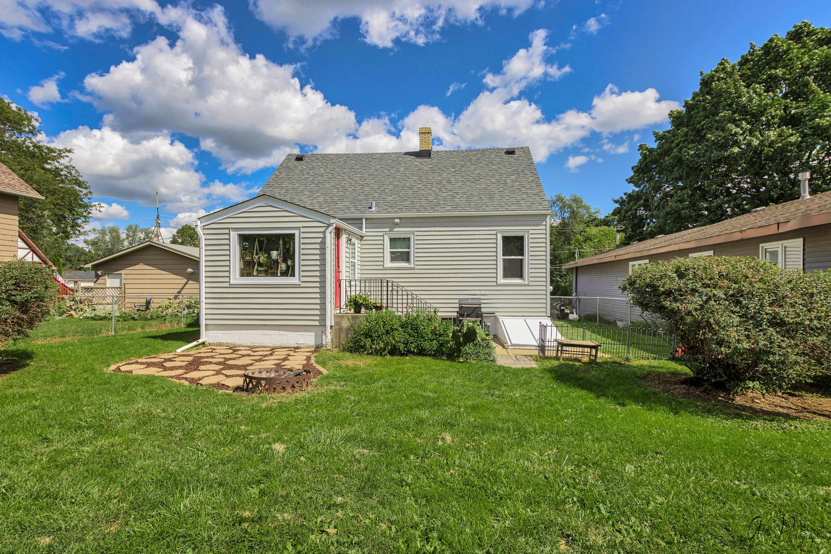 34 Lippincott Road Fox Lake, IL 60020 - Photo 23 of 24 a front view of a house with a yard and garage