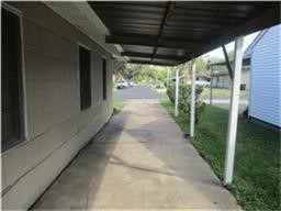6520 Crosswell Street Houston, TX 77087 - Photo 3 of 11 Long carport area to protect vehicles from the rain and Houston's sun
