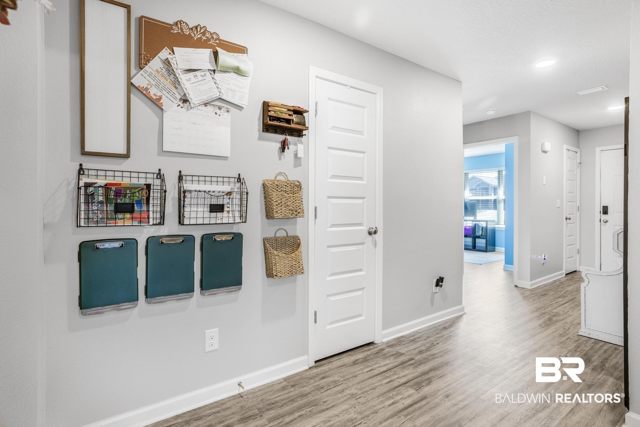 10738 Ridgeview Drive Mobile, AL 36608 - Photo 3 of 48 Corridor with light wood-type flooring and recessed lighting