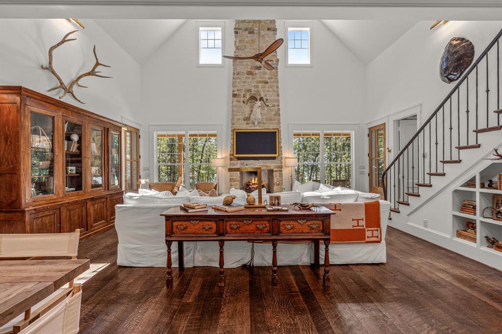 877 Private Road 7893 Mineola, TX 75773 - Photo 12 of 40 a living room with furniture a fireplace and a large window