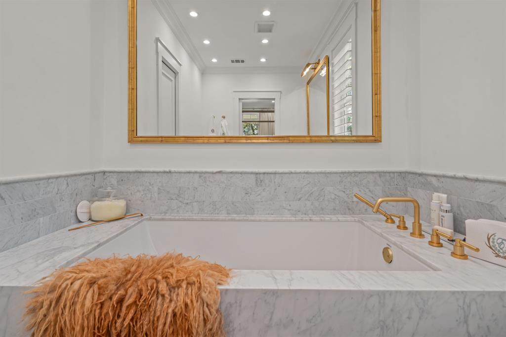 877 Private Road 7893 Mineola, TX 75773 - Photo 24 of 40 a bathroom with a tub and sink