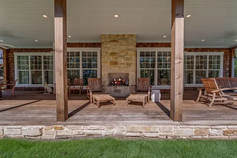 a outdoor space with patio the couches and a dining table with garden view
