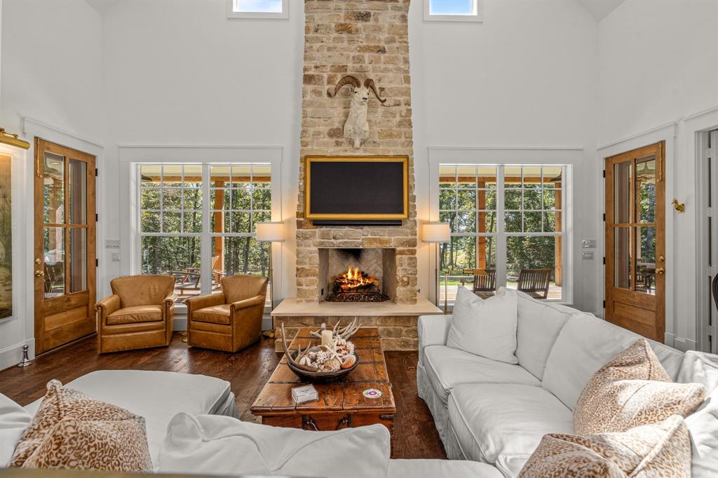 877 Private Road 7893 Mineola, TX 75773 - Photo 5 of 40 a living room with furniture large window and a fireplace