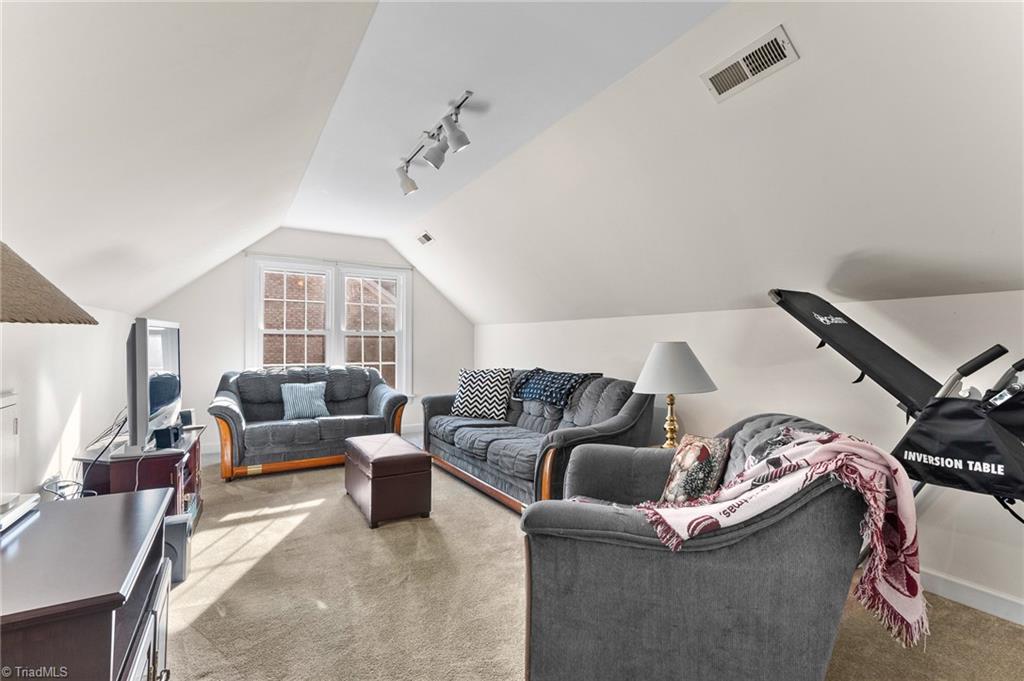 2505 Burch Point High Point, NC 27265 - Photo 23 of 39 Great space for separate entertaining! This spacious Bonus room is perfect for a work space, exercise space, or Movie/entertaining! It has a closet so could be a possible bedroom if you need the space!