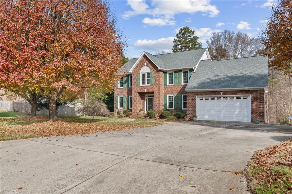 2505 Burch Point High Point, NC 27265 - Photo 4 of 39 Check out this extra paved parking space! Lots of room for family and friends!