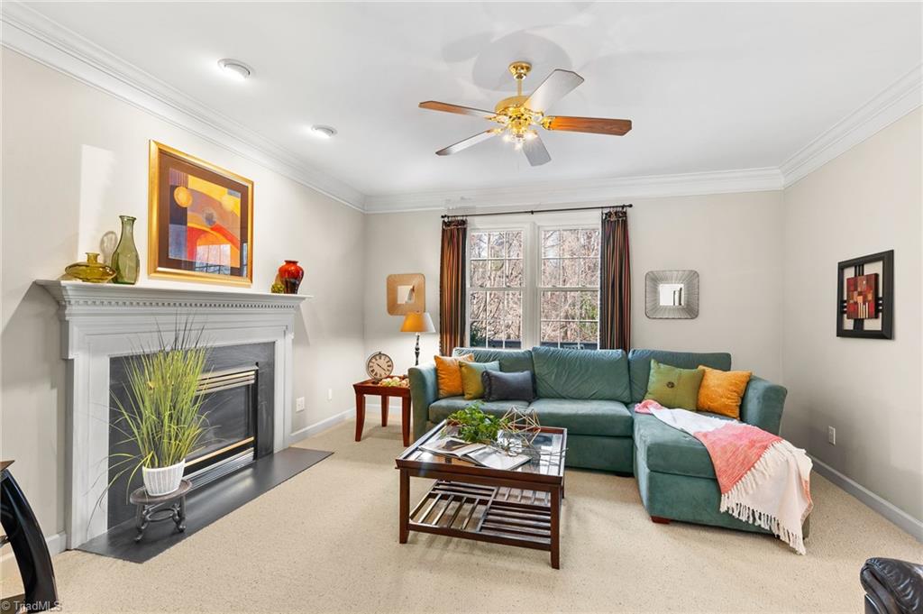2505 Burch Point High Point, NC 27265 - Photo 8 of 39 Beautiful Den/family room located off the kitchen! Loos out to private wooded views!