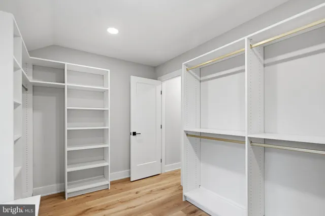 a view of an empty walk in closet